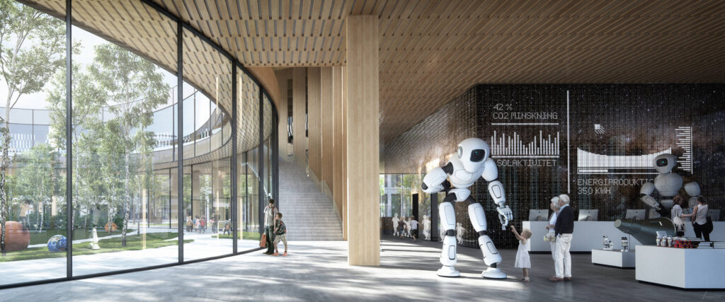 Image of girl touching robot sculpture in glass lobby if a science center.